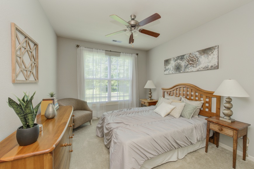 Model bedroom in a Fishers apartment.