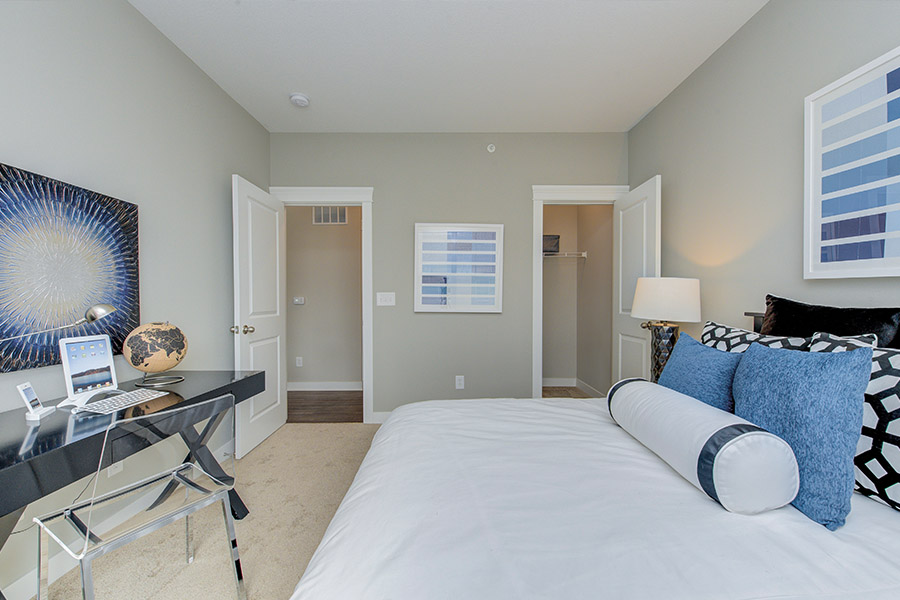 A clean and spacious bedroom located at Highpointe Apartments.